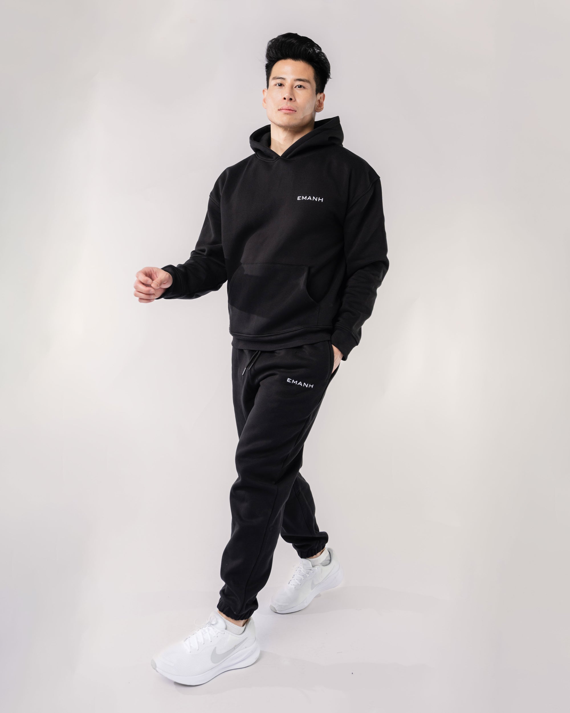 Progress Black Hoodie Walking